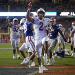 
              Utah running back Micah Bernard (2) celebrates in the end zone after rushing for a 7-yard touchdown during the second half of the team's NCAA college football game against Florida, Saturday, Sept. 3, 2022, in Gainesville, Fla. (AP Photo/Phelan M. Ebenhack)
            