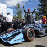 
              Scott McLaughlin raises his arms in victory at the Grand Prix of Portland IndyCar auto race at the Portland International Raceway in Portland, Ore., on Sunday, Sept. 4, 2022. (Naji Saker/The Oregonian via AP)
            