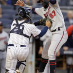 
              New York Yankees catcher Jose Trevino tags out Minnesota Twins' Gilberto Celestino during the 10th inning of the first baseball game of a doubleheader Wednesday, Sept. 7, 2022, in New York. (AP Photo/Adam Hunger)
            