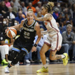
              Chicago Sky guard Courtney Vandersloot drives to the basket as Connecticut Sun guard Natisha Hiedeman, right, defends during Game 4 of a WNBA basketball playoff semifinal Tuesday, Sept. 6, 2022, in Uncasville, Conn. (AP Photo/Jessica Hill)
            