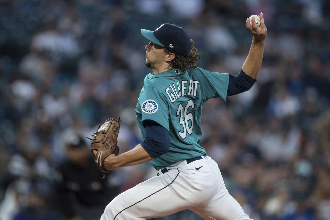 Seattle Mariners starter Logan Gilbert delivers a pitch during the first inning of the team's baseb...