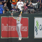 
              Oakland Athletics left fielder Cody Thomas catches a fly ball in foul territory by Houston Astros' Yordan Alvarez during the fifth inning of a baseball game Thursday, Sept. 15, 2022, in Houston. (AP Photo/David J. Phillip)
            