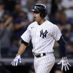 
              New York Yankees' Isiah Kiner-Falefa reacts after hitting a grand slam against the Minnesota Twins during the fourth inning of the second baseball game of a doubleheader Wednesday, Sept. 7, 2022, in New York. (AP Photo/Adam Hunger)
            