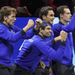 
              Team Europe's Casper Rudd, Matteo Berrettini, Roger Federer and Andy Murray watch Team Europe's Cameron Norrie play Team World's Taylor Fritz in a men's singles match, on the second day of the Laver Cup tennis tournament at the O2 in London, Saturday, Sept. 24, 2022. (John Walton/PA via AP)
            