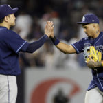 
              Tampa Bay Rays' Wander Franco, right, high-fives Ji-Man Choi after a baseball game against the New York Yankees, Friday, Sept. 9, 2022, in New York. (AP Photo/Adam Hunger)
            
