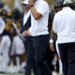 
              California head coach Justin Wilcox stands on the sideline during the first half of an NCAA college football game against UNLV in Berkeley, Calif., Saturday, Sept. 10, 2022. (AP Photo/Jed Jacobsohn)
            