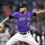 
              Colorado Rockies starting pitcher Kyle Freeland works against the San Francisco Giants during the first inning of a baseball game Tuesday, Sept. 20, 2022, in Denver. (AP Photo/David Zalubowski)
            