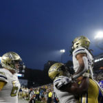 
              Georgia Tech wide receiver Nate McCollum, right, celebrates with offensive lineman Jordan Williams, center, after scoring a touchdown in the first half during an NCAA college football game against Western Carolina, Saturday, Sept. 10, 2022, in Atlanta. (AP Photo/Brynn Anderson)
            