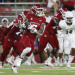 
              Fresno State wide receiver Jalen Moreno-Cropper runs for a long gain against Cal Poly during the first half of an NCAA college football game in Fresno, Calif., Thursday, Sept. 1, 2022. (AP Photo/Gary Kazanjian)
            
