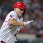 
              Los Angeles Angels' Mike Trout runs on the way to a double during the fifth inning of the team's baseball game against the Texas Rangers in Anaheim, Calif., Friday, Sept. 30, 2022. (AP Photo/Alex Gallardo)
            