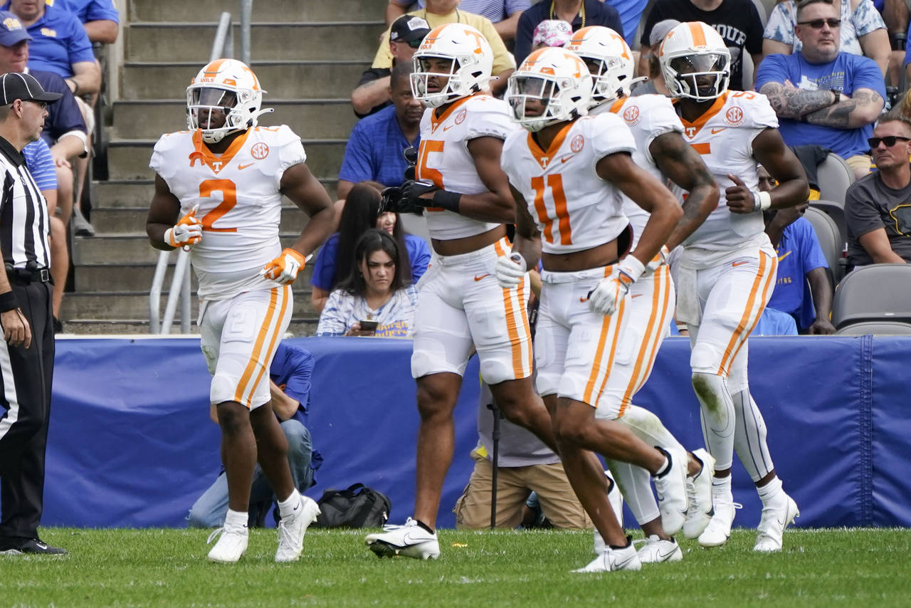 Tennessee running back Jabari Small (2), leads his team from the field after he scored a touchdown ...