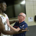 
              New Orleans Pelicans power forward Zion Williamson (1) jokes with David Griffin, executive vice president of basketball operations, during the NBA Pelicans basketball media day in New Orleans, Monday, Sept. 26, 2022. (AP Photo/Matthew Hinton)
            
