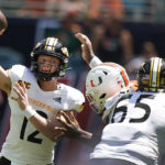 
              Southern Miss quarterback Zach Wilcke (12) passes during the first half of an NCAA college football game against Miami, Saturday, Sept. 10, 2022, in Miami Gardens, Fla. (AP Photo/Wilfredo Lee)
            