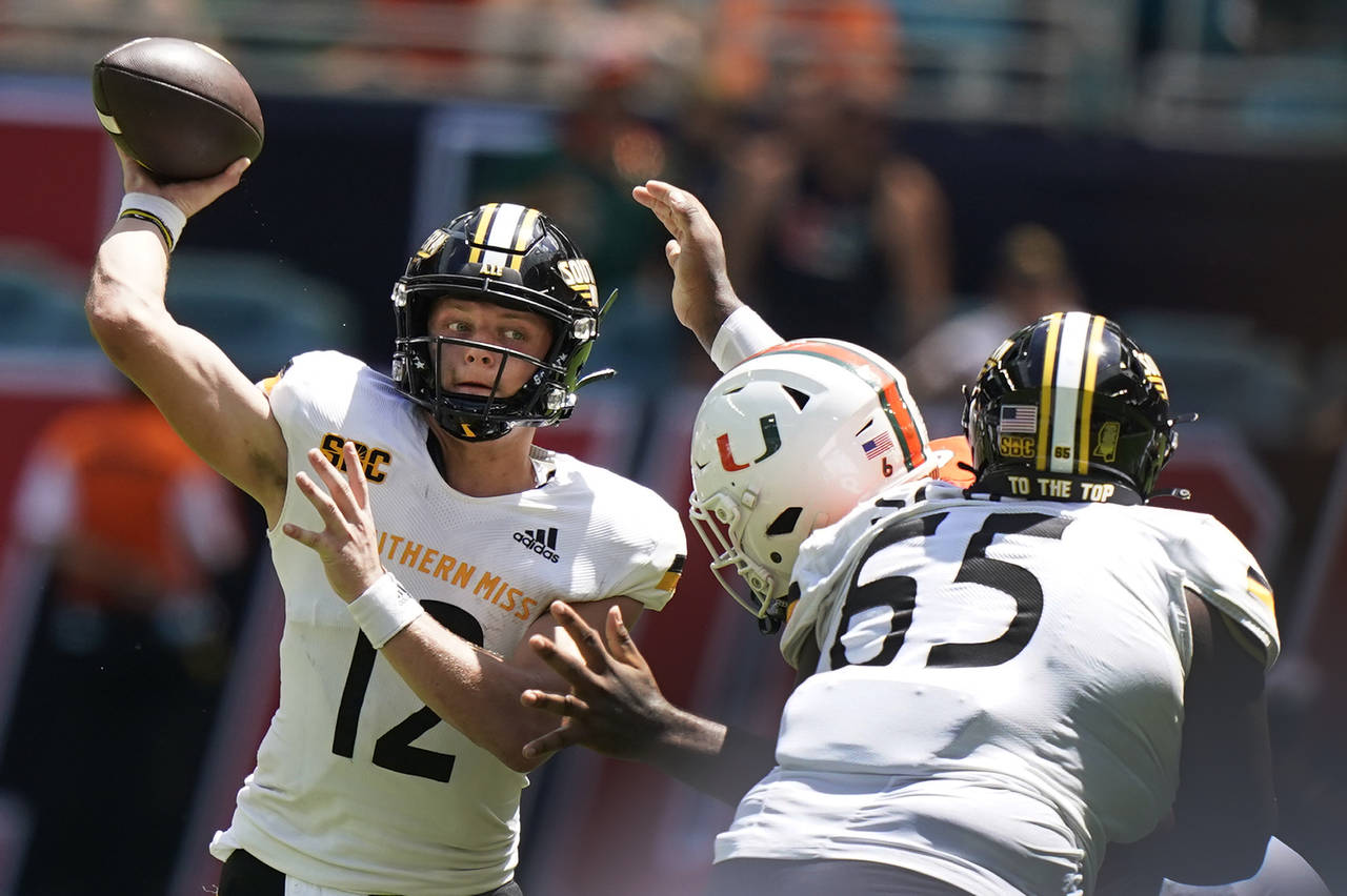 Southern Miss quarterback Zach Wilcke (12) passes during the first half of an NCAA college football...