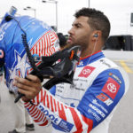
              Bubba Wallace prepares for qualifying for the NASCAR Cup Series auto race at Kansas Speedway in Kansas City, Kan., Saturday, Sept. 10, 2022. (AP Photo/Colin E. Braley)
            