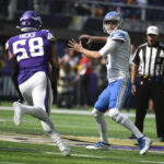 
              Detroit Lions quarterback Jared Goff, right, throws a pass over Minnesota Vikings linebacker Jordan Hicks (58) during the first half of an NFL football game, Sunday, Sept. 25, 2022, in Minneapolis. (AP Photo/Craig Lassig)
            