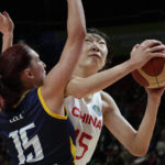 
              China's Han Xu, right, battles to get past Bosnia and Herzegovina's Nikolina Elez during their game at the women's Basketball World Cup in Sydney, Australia, Friday, Sept. 23, 2022. (AP Photo/Mark Baker)
            