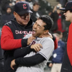 
              Cleveland Guardians manager Terry Francona, left, and left fielder Steven Kwan celebrate the team's win against the Chicago White Sox in a baseball game Thursday, Sept. 22, 2022, in Chicago. (AP Photo/David Banks)
            