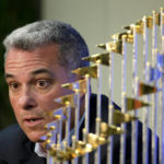 
              FILE - Kansas City Royals general manager Dayton Moore speaks to members of the media alongside the Royals' World Series trophy during a news conference wrapping up the team's season, in Kansas City, Mo., Nov. 5, 2015. The Kansas City Royals, Wednesday, Sept. 21, 2022, fired longtime general manager Dayton Moore. (AP Photo/Charlie Riedel, File)
            
