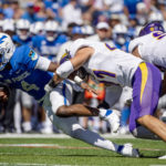 
              Air Force quarterback Haaziq Daniels (4) is sacked by Northern Iowa running back Kendall Robinson (31) during an NCAA college football game Saturday Sept. 3, 2022, in Colorado Springs, Colo. (Parker Seibold/The Gazette via AP)
            