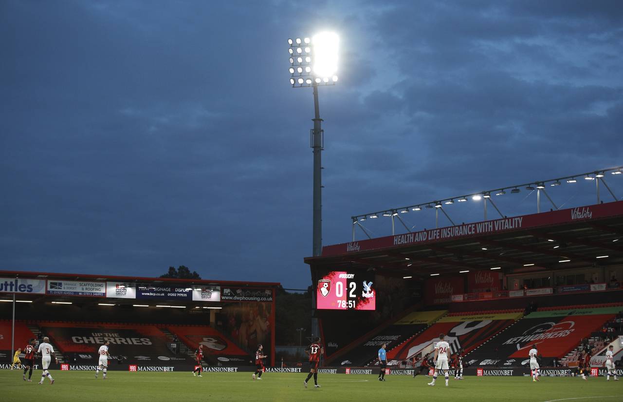 FILE - Players under the floodlights during the English Premier League soccer match between Bournem...