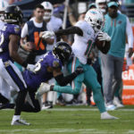 
              Baltimore Ravens safety Chuck Clark (36) tackles Miami Dolphins wide receiver Tyreek Hill (10) during the second half of an NFL football game, Sunday, Sept. 18, 2022, in Baltimore. (AP Photo/Nick Wass)
            
