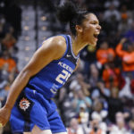 
              Connecticut Sun's Alyssa Thomas reacts during the first half in Game 3 of a WNBA basketball final playoff series against the Las Vegas Aces, Thursday, Sept. 15, 2022, in Uncasville, Conn. (AP Photo/Jessica Hill)
            