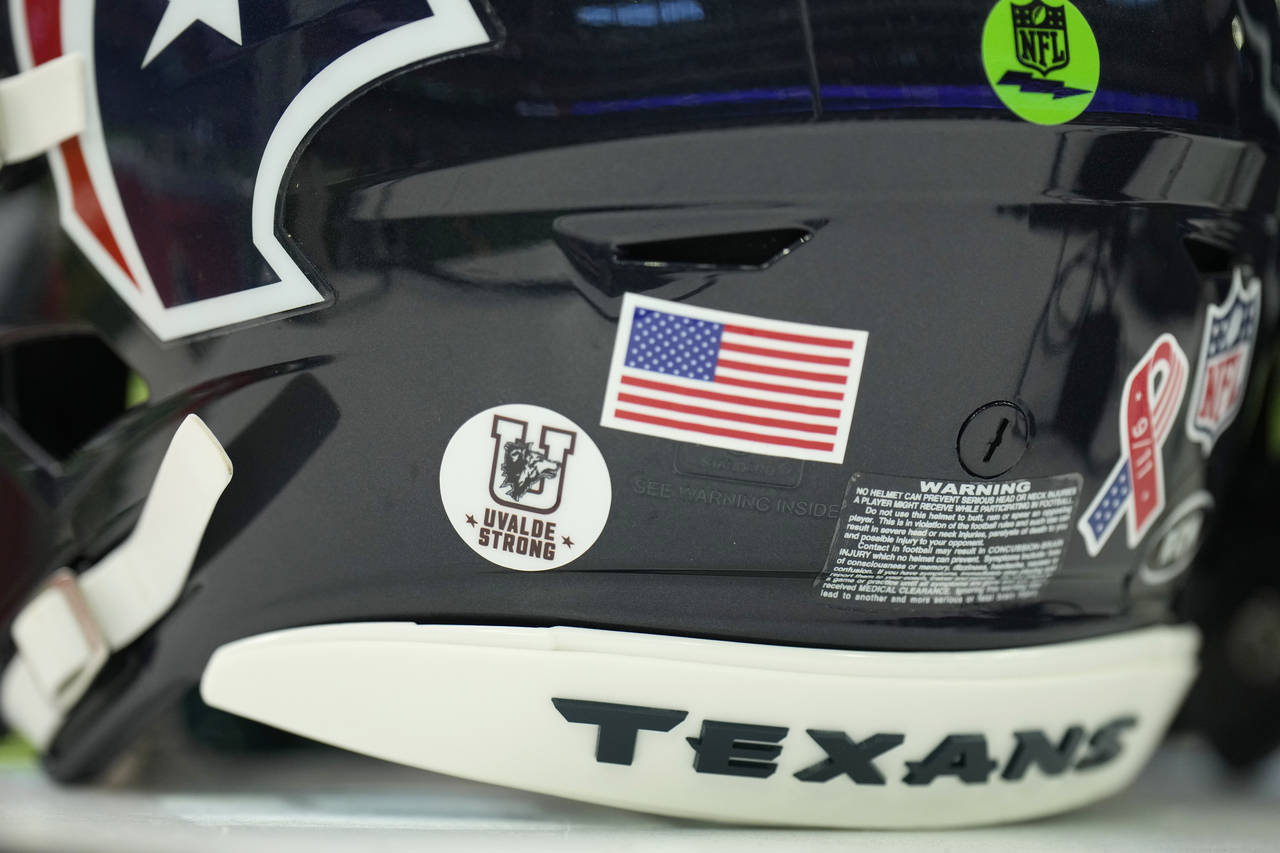 A Uvalde strong sticker is displayed on a Houston texans helmet prior to an NFL football game Sunda...