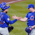 
              Chicago Cubs relief pitcher Erich Uelmen, right, celebrates with catcher P.J. Higgins after getting the final out of a baseball game against the Pittsburgh Pirates in Pittsburgh, Friday, Sept. 23, 2022. (AP Photo/Gene J. Puskar)
            