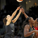 
              Seattle Storm guard Sue Bird (10) makes a basket during the first half of Game 4 of a WNBA basketball playoff semifinal against  the Las Vegas Aces Tuesday, Sept. 6, 2022, in Seattle. (AP Photo/Lindsey Wasson)
            