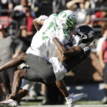 
              Washington State defensive back Chau Smith-Wade (6) tackles Oregon wide receiver Troy Franklin (11) during the second half of an NCAA college football game, Saturday, Sept. 24, 2022, in Pullman, Wash. (AP Photo/Young Kwak)
            