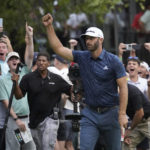 
              Dustin Johnson celebrates after sinking a putt to win the tournament on the first playoff hole on the 18th in the LIV Golf Invitational-Boston tournament, Sunday, Sept. 4, 2022, in Bolton, Mass. (AP Photo/Mary Schwalm)
            