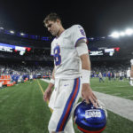 
              New York Giants quarterback Daniel Jones (8) walks off the field after the Giants lost to the Dallas Cowboys 23-16 in an NFL football game, Monday, Sept. 26, 2022, in East Rutherford, N.J. (AP Photo/Adam Hunger)
            