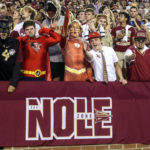 
              Florida State fans pose before an NCAA college football game against Boston College on Saturday, Sept. 24, 2022, in Tallahassee, Fla. (AP Photo/Gary McCullough)
            