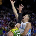 
              Vlatko Cancar of Slovenia, right, in action against Jonas Valanciunas of Lithuania during the FIBA EuroBasket 2022 group B stage match between Slovenia and Lithuania in Cologne, Germany, Thursday, Sept. 1, 2022. (Zsolt Czegledi/MTI via AP)
            
