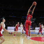 
              United States' A'ja Wilson reaches up to intercept the ball during their semifinal game at the women's Basketball World Cup against Canada in Sydney, Australia, Friday, Sept. 30, 2022. (AP Photo/Mark Baker)
            