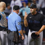 
              Miami Marlins relief pitcher Richard Bleier, right, argues with home plate umpire Ryan Blakney, center, after being ejected after the eighth inning of the team's baseball game against the New York Mets on Tuesday, Sept. 27, 2022, in New York. The Marlins won 6-4. (AP Photo/Frank Franklin II)
            
