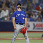 
              Toronto Blue Jays relief pitcher Anthony Bass reacts after giving up a three-run home run to the Tampa Bay Rays during the fifth inning of a baseball game Friday, Sept. 23, 2022, in St. Petersburg, Fla. (AP Photo/Scott Audette)
            