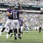 
              Baltimore Ravens' Devin Duvernay (13) celebrates with Mark Andrews after catching a pass for a touchdown during the second half of an NFL football game against the New York Jets, Sunday, Sept. 11, 2022, in East Rutherford, N.J. (AP Photo/Adam Hunger)
            