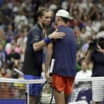 
              Daniil Medvedev, left, of Russia, and Nick Kyrgios, right, of Australia, greet each other after Kyrgios won the match during the fourth round of the U.S. Open tennis championships, Sunday, Sept. 4, 2022, in New York. (AP Photo/Adam Hunger)
            