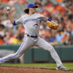 
              Toronto Blue Jays starting pitcher Kevin Gausman throws a pitch to the Baltimore Orioles during the third inning of the first game of a baseball doubleheader, Monday, Sept. 5, 2022, in Baltimore. (AP Photo/Julio Cortez)
            