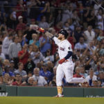 
              Boston Red Sox's Alex Verdugo celebrates after his home run as he runs the bases in the sixth inning of a baseball game against the Texas Rangers, Thursday, Sept. 1, 2022, in Boston. (AP Photo/Steven Senne)
            