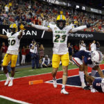 
              North Dakota State cornerback Jayden Price (23) and safety Dom Jones react after breaking up an Arizona pass during the second half of an NCAA college football game Saturday, Sept. 17, 2022, in Tucson, Ariz. (AP Photo/Chris Coduto)
            