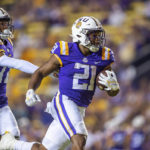 
              LSU's Noah Cain runs for a touchdown against New Mexico during an NCAA college football game Saturday, Sept. 24, 2022, in Baton Rouge, La. (Scott Clause/The Daily Advertiser via AP)
            