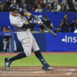 
              New York Yankees' Aaron Judge grounds out against the Toronto Blue Jays during the fourth inning of a baseball game Wednesday, Sept. 28, 2022, in Toronto. (Nathan Denette/The Canadian Press via AP)
            