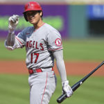 
              Los Angeles Angels' Shohei Ohtani tips his cap before stepping into the batter's box during the first inning of a baseball game against the Cleveland Guardians, Wednesday, Sept. 14, 2022, in Cleveland. (AP Photo/David Dermer)
            