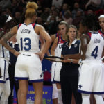 
              United States' coach Cheryl Reeve, third right, talks with her players during a brea in play against Belgium during their women's Basketball World Cup game in Sydney, Australia, Thursday, Sept. 22, 2022. (AP Photo/Mark Baker)
            