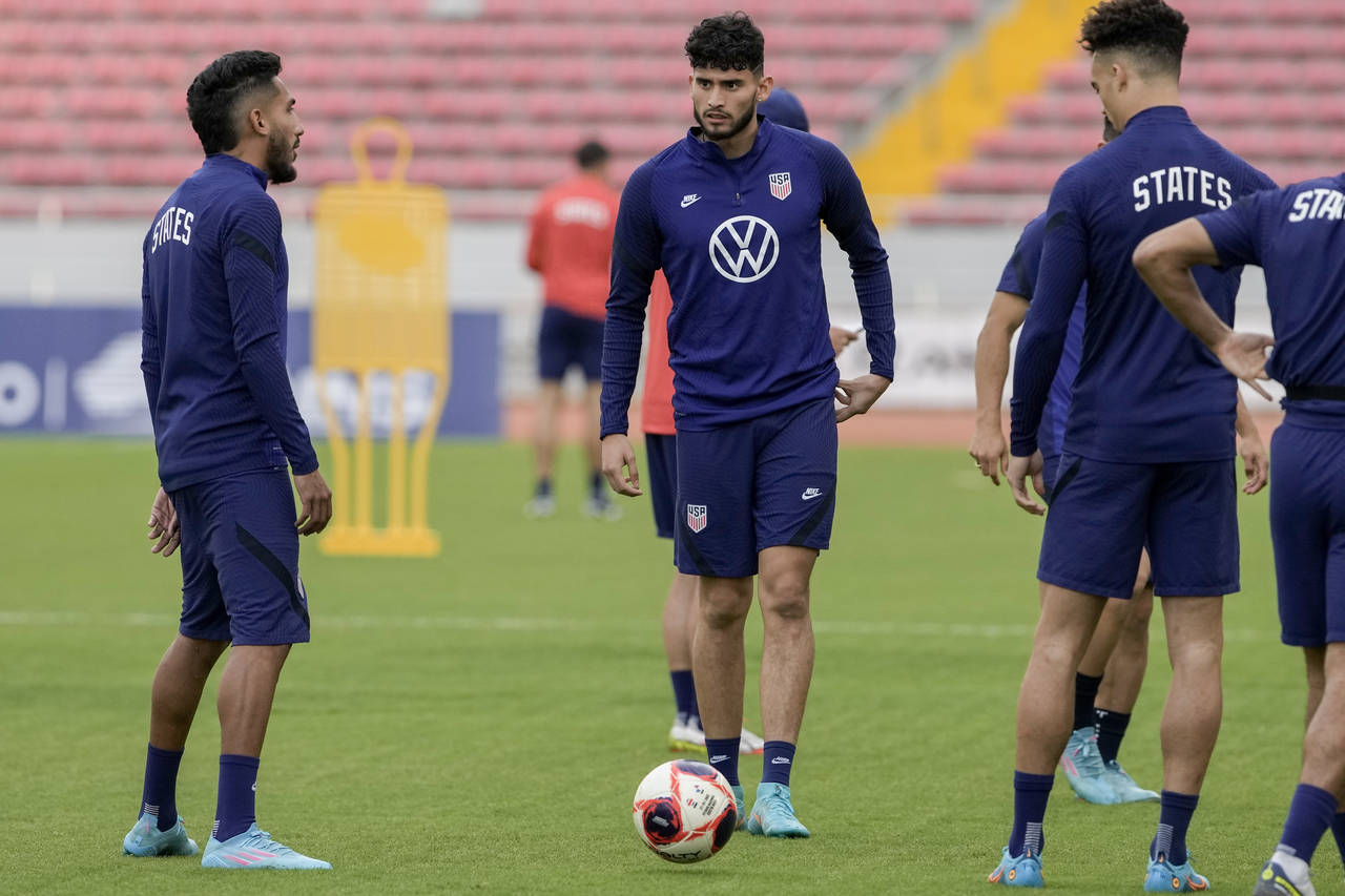 FILE - United States' Ricardo Pepi, center, attends a training session ahead of a qualifying soccer...