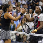 
              Caroline Garcia, of France, left, shakes hands with Coco Gauff, of the United States, after a quarterfinal of the U.S. Open tennis championships, Tuesday, Sept. 6, 2022, in New York. Garcia won the match. (AP Photo/Charles Krupa)
            