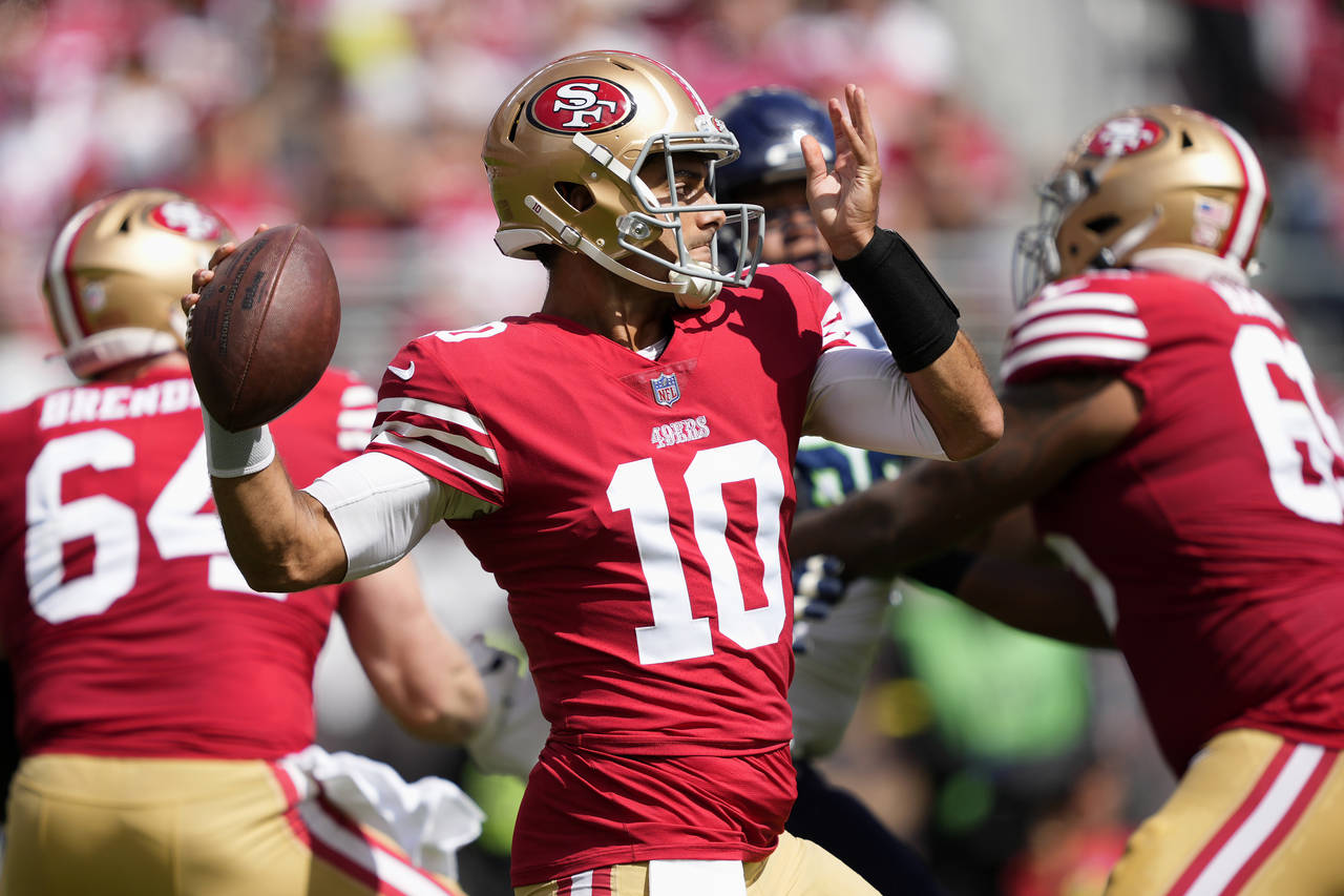 San Francisco 49ers quarterback Jimmy Garoppolo (10) passes against the Seattle Seahawks during the...